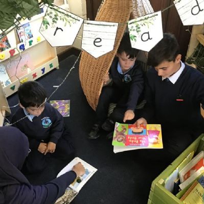 Reading Buddies. Once each week we pair up with a buddy from a different class to read.